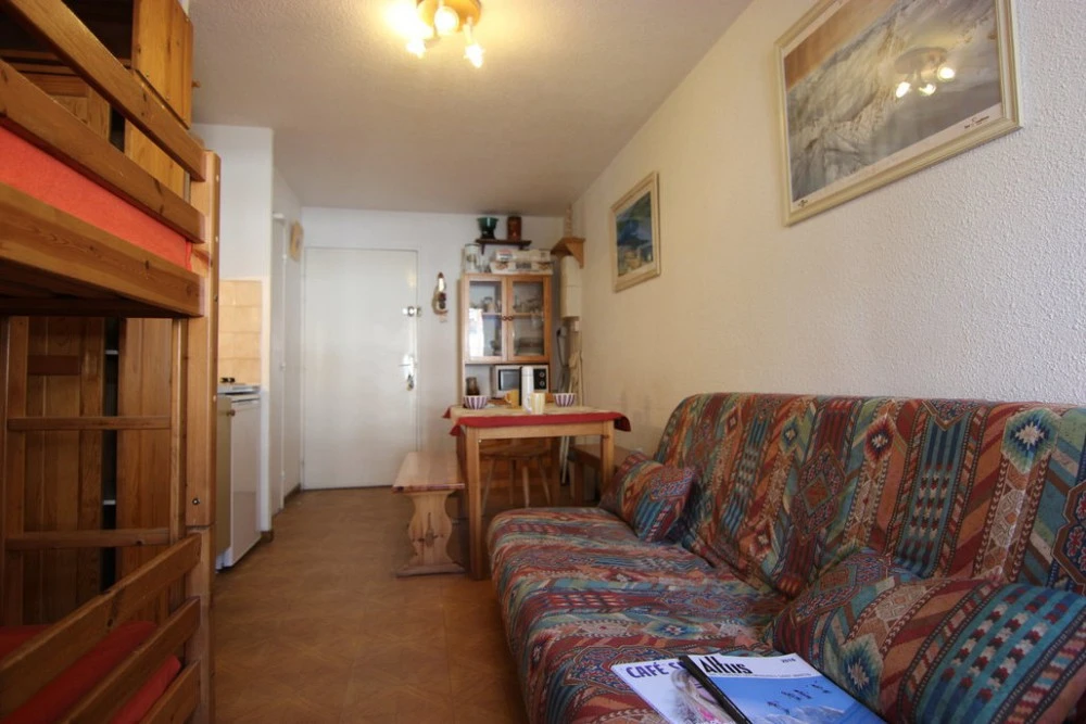Val Thorens | Les Cimes De Caron - CC1206 - woonkamer met zitbank en stapelbed