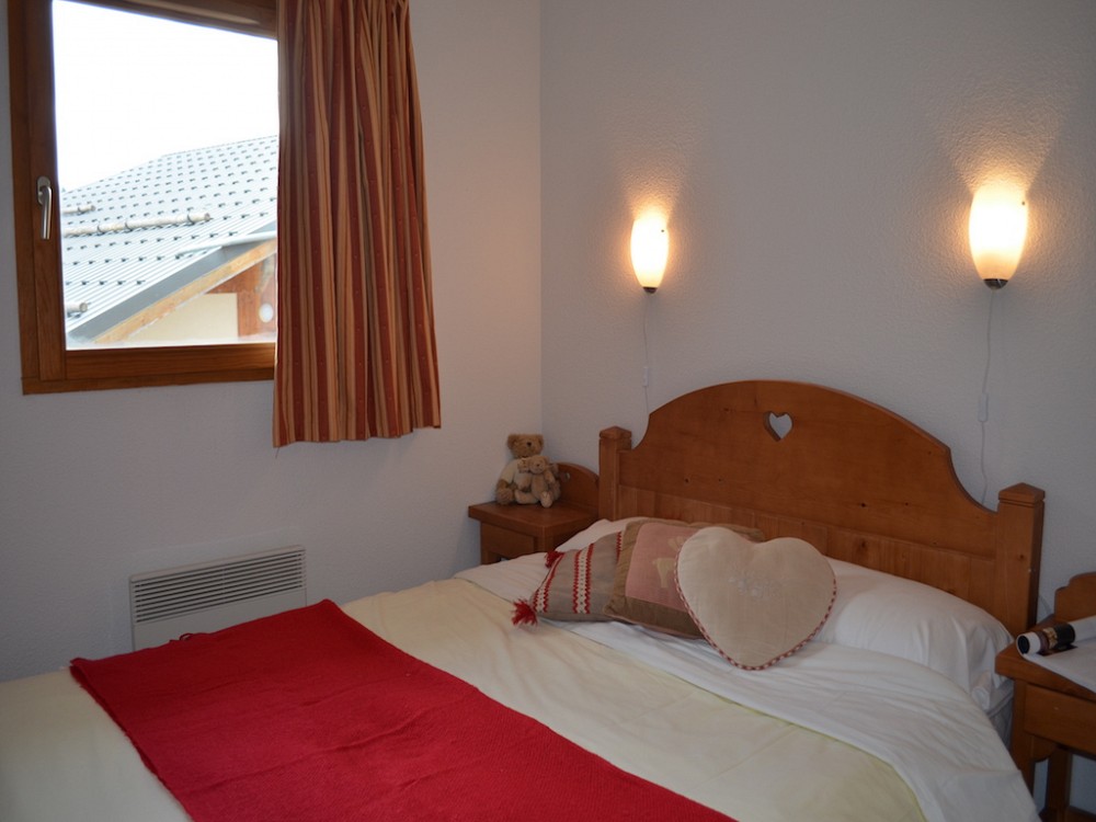 Les Chalets de la Ramoure - slaapkamer met 2-persoonsbed