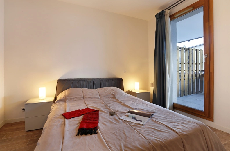 Au Coeur des Ours - slaapkamer met balkon en 2-persoonsbed