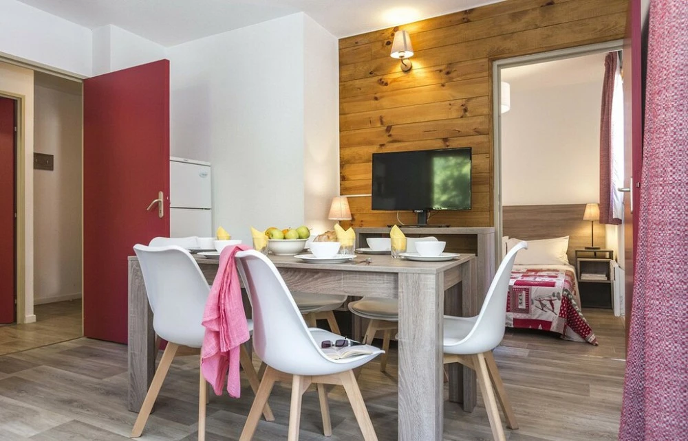 Residence Les Sybelles - eetkamer met tafels en stoelen