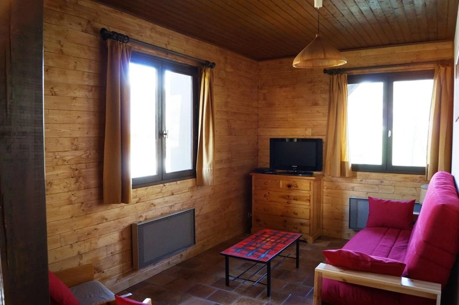 Chalet L'Arolle - 2-kamer apt. voor max. 4 pers. - woonkamer met koffietafel en tv