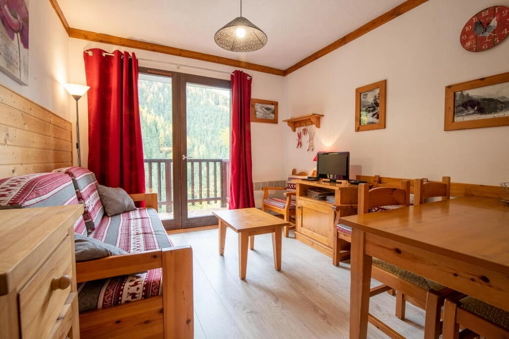 Les Chalets du Thabor - woonkamer met zitbank
