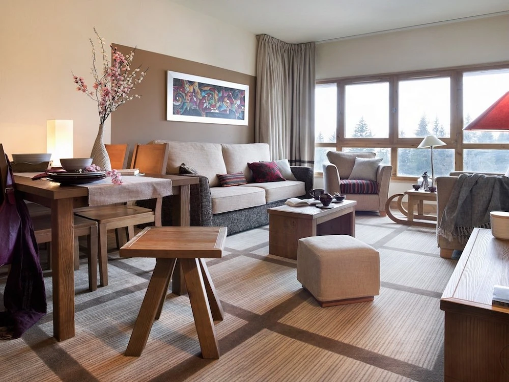 Les Terrasses d'Eos - woonkamer met eettafel