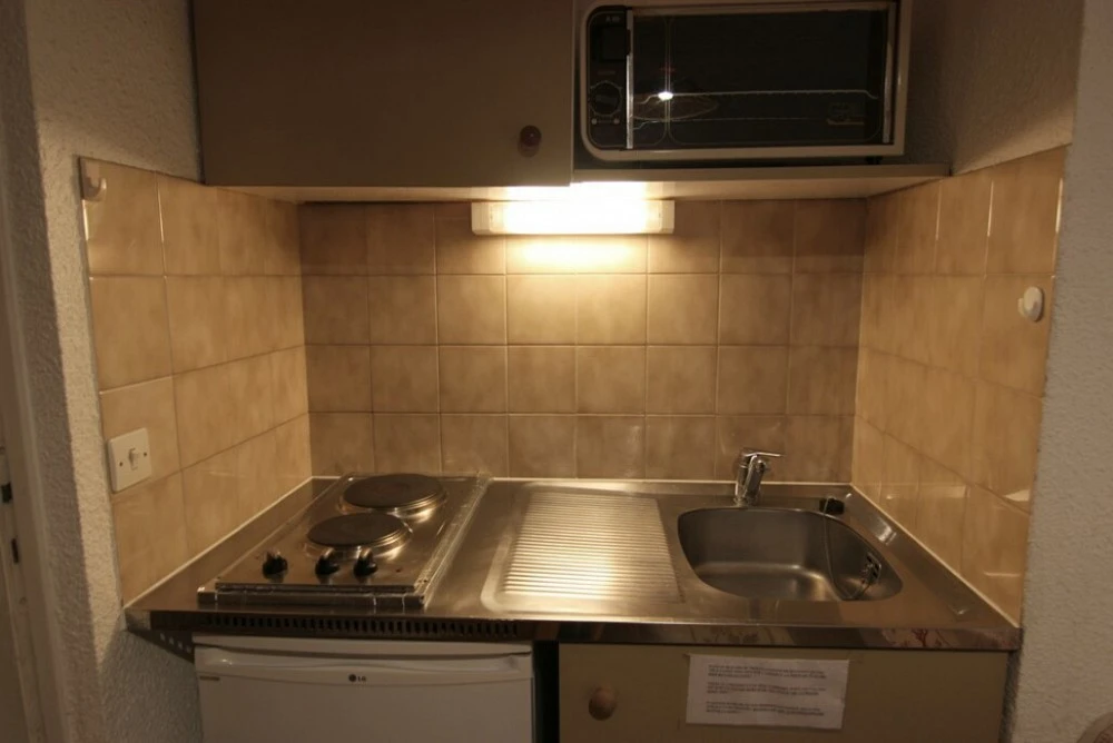 Val Thorens | Les Cimes De Caron - CC2206 - keuken met vaatwasser en fornuis