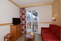 chalet Les Bergers - woonkamer met tv en zitbank