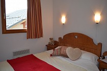 Les Chalets de la Ramoure - slaapkamer met 2-persoonsbed