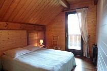 Chalet L'Arolle - 6-kamer apt. voor max. 12 pers. - slaapkamer met deur naar balcon