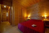 Les Chalets des Marmottes *** - slaapkamer met tweepersoonsbed