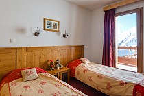 L'Ecrin des Sybelles **** - slaapkamer met balkon
